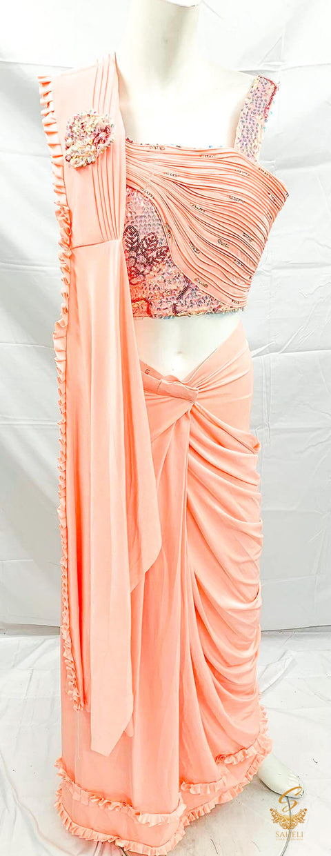 Size 38 (upto 42)  Peach colour designer sequined blouse with readymade saree
