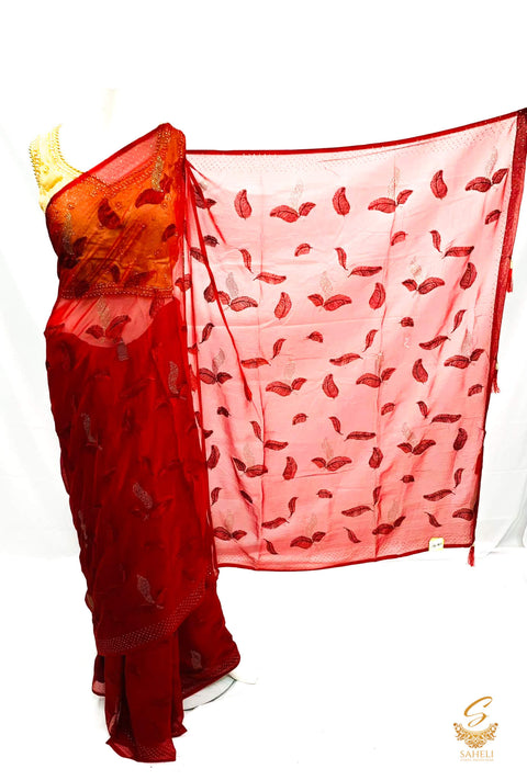 Ruby colour pure shimmery georgette based stone work with leaf resham embroidery work beautiful soft saree