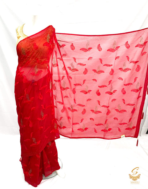 Maroon colour pure shimmery georgette based stone work with leaf resham embroidery work beautiful soft saree