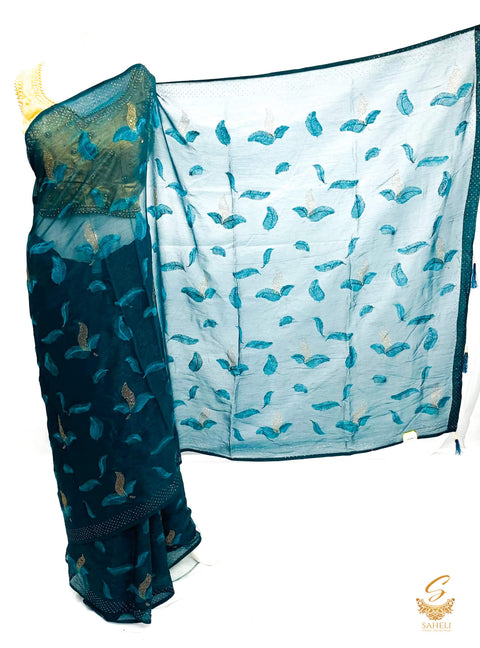 Peacock blue colour pure shimmery georgette based stone work with leaf resham embroidery work beautiful soft saree