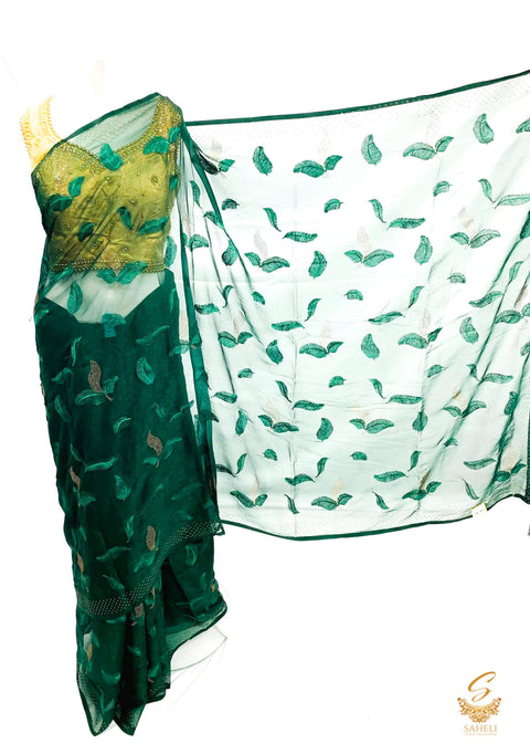 Deep Kai green colour pure shimmery georgette based stone work with leaf resham embroidery work beautiful soft saree