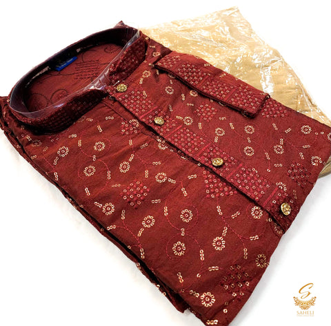 Deep Maroon colour silk based all over embroidered mens kurta with golden colour pajama pents