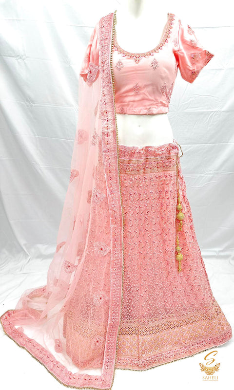 Pastel Pink colour netting based beautiful heavy embroidered work heavy ken ken big flare stitched Lehnga & Blouse with attached Tessels & heavy lace border beaded work DupattaSize 44 (UPTO 48)