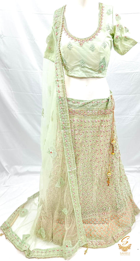 Pastel Mint colour netting based beautiful heavy embroidered work heavy ken ken big flare stitched Lehnga & Blouse with attached Tessels & heavy lace border beaded work DupattaSize 44 (UPTO 48)