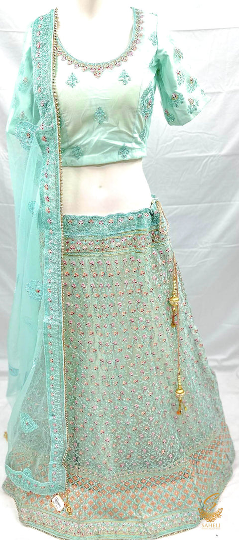 Pastel Icing Blue colour netting based beautiful heavy embroidered work heavy ken ken big flare stitched Lehnga & Blouse with attached Tessels & heavy lace border beaded work DupattaSize 40 (UPTO 46)