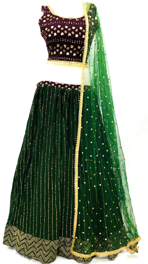 Deep Wine colour georgette based heavy sequined work crop top with deep Forest green colour georgette based golden work heavy flared ken ken lehnga with netting dupatta (Size 38 (upto 40))