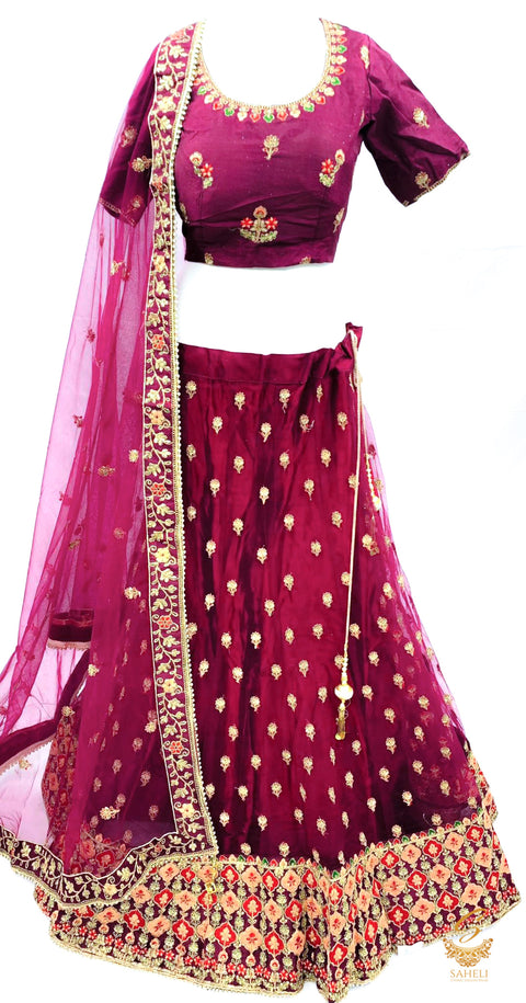 Deep Wine Purple colour netting based beautiful heavy embroidered work heavy ken ken big flare stitched Lehnga & Blouse with attached Tessels & heavy lace border beaded work DupattaSize 42 (UPTO 48)