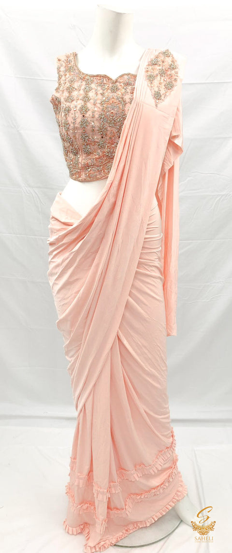 Size (40 (upto 42) Pastel Peach colour netting based handwork with fine stones & mirror work beautiful designer blouse with readymade saree