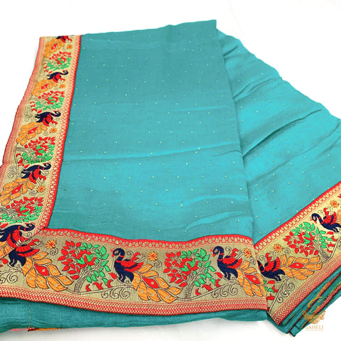 Sea Green colour crepe silk based beautiful border with fine stone work on soft saree