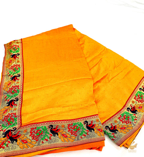 Deep Gold Yellow colour crepe silk based beautiful border with fine stone work on soft saree