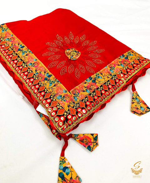 Red colour crepe silk based beautiful border with fine stone work on soft saree
