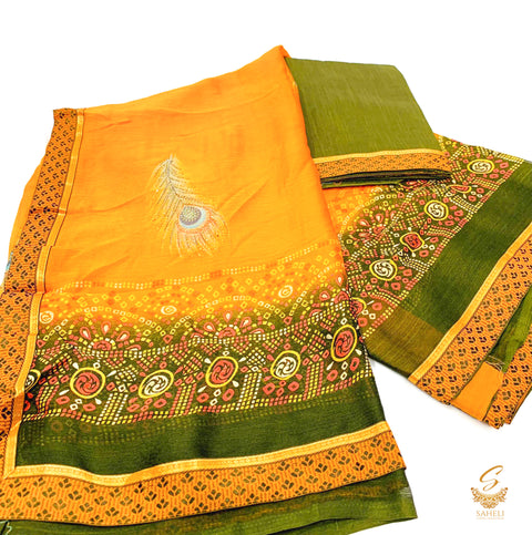 Orange colour pure patola georgette based peacock feather print Saree