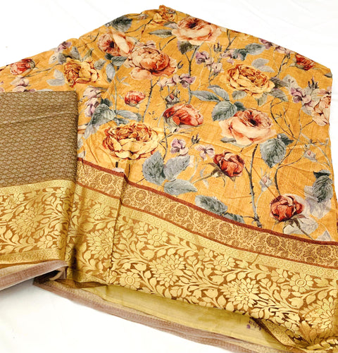 Golden colour crepe silk based floral print with zari border