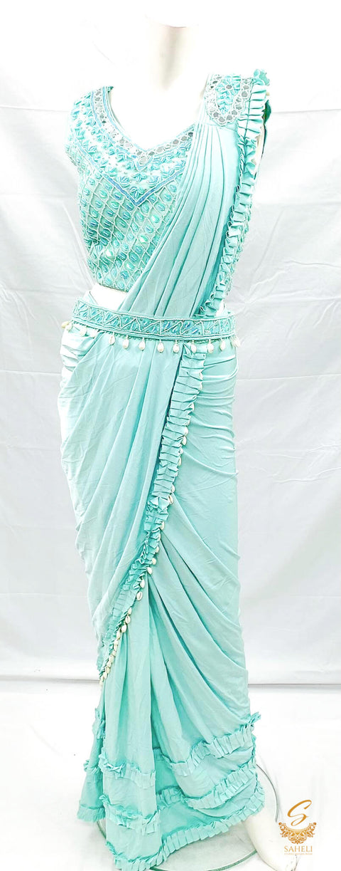 Size (40 (upto 42)Pastel Blue colour netting based handwork with seashells & mirror work beautiful designer blouse with readymade saree & seashells work designer waist belt