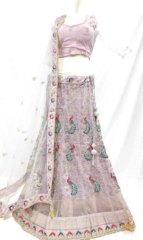 (SIZE 42 (Upto 46)) Pastel Lavender colour netting Based Beautiful multicoloured Embroidery Work With sequined Stones work Very Heavy Ken Ken Heavy Designer Lehnga With Heavy Tessels Attached To Blouse & Lehnga With Heavy Work Contrast Dupatta