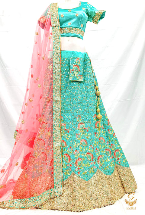 Size 42(upto 46)Sea green colour heavy embroidery work with sequined work heavy ken ken lehnga with stitched blouse & Peachy Pink netting dupatta with heavy lace border