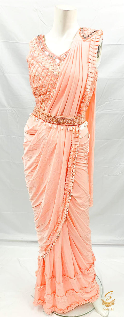 Size (40 (upto 42)Pastel Peach colour netting based handwork with seashells & mirror work beautiful designer blouse with readymade saree & seashells work designer waist belt