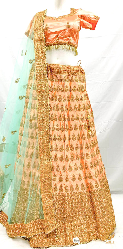 Size 40(upto 44) Pastel Peach colour golden shimmer thread embroidery work design lehnga with stitched blouse & seafoam netting dupatta with heavy lace border