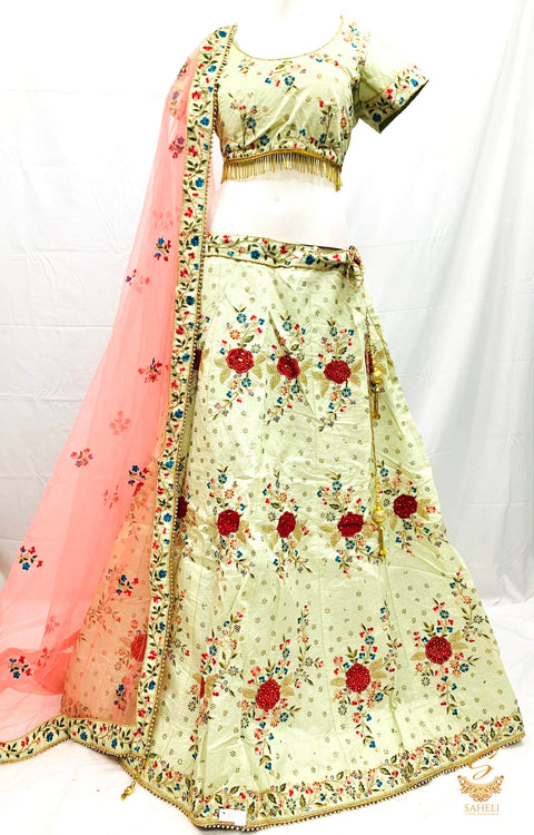 Size 44(upto 48) Pastel Mint colour  silk based heavy embroidery & Stone work heavy flared designer Lehnga & stitched blouse with beautiful lace design & heavy work border pastel pink colour netting dupatta