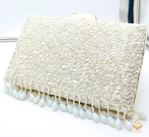 white colour sequined handwork designer clutch with pearls hanging