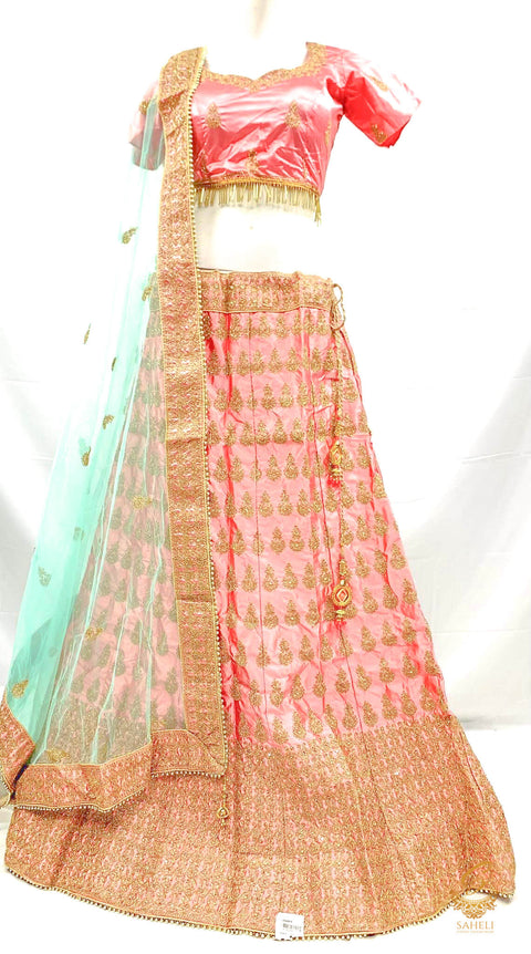 Size 40(upto 44) Peachy Pink colour golden shimmer thread embroidery work design lehnga with stitched blouse & seafoam green netting dupatta with heavy lace border