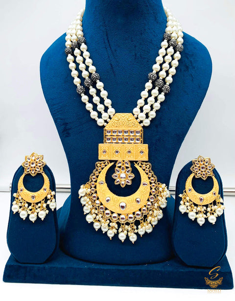 Golden colour meenkari with kundan work pendant Long rani haar with pearl work set with beautiful design earrings