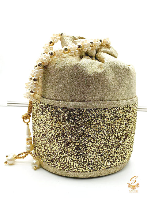 Dark Golden colour sippy beaded shimmery work with pearl work handle beautiful Potli Bag
