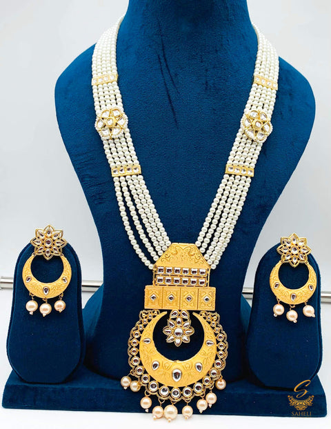 Golden colour meenkari with kundan work pendant Long rani haar with pearl work set with beautiful design earrings