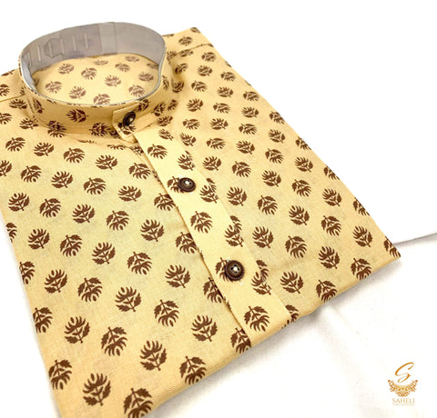 Golden colour raw silk based kids printed kurta with white pajama pents