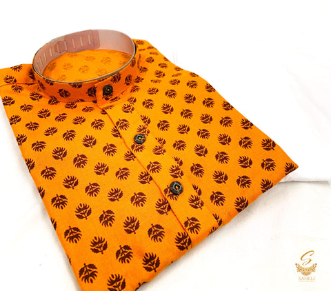 Orange colour raw silk based kids printed kurta with white pajama pents