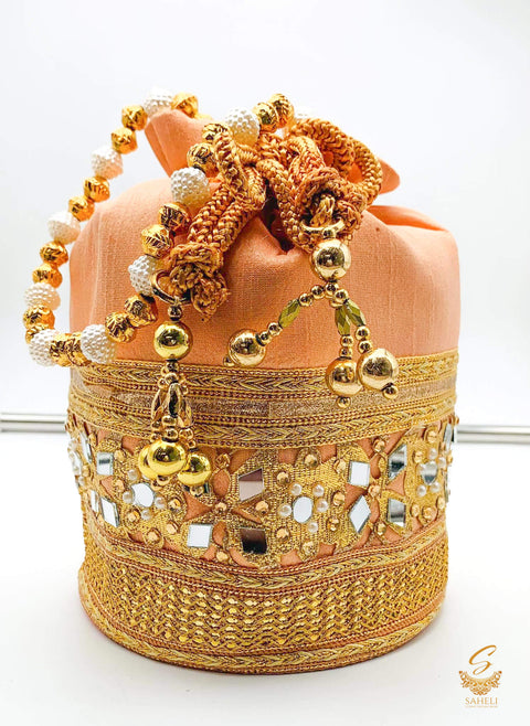 Pastel Peach Colour silk Based Mirror Work With Pearl Work Handle Beautiful Potli Bag