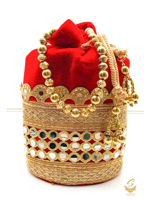 Red colour velvet based mirror work with pearl work handle beautiful Potli Bag