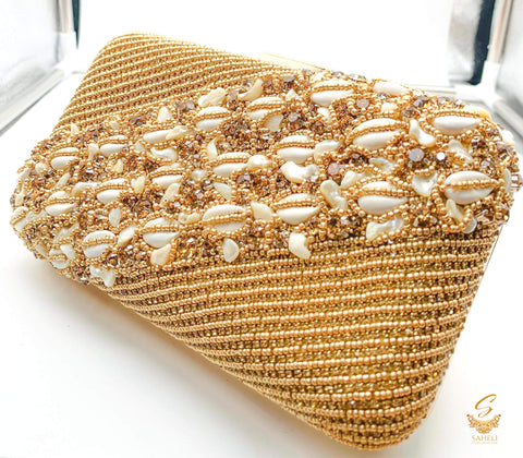 Gold colour beautiful handwork with pearl beaded with Sea Shells and Crystal stone designer clutch