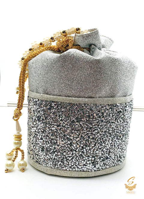 Silver  colour sippy beaded shimmery work with pearl work handle beautiful Potli Bag