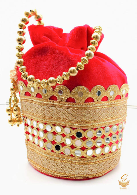 Hot Pink colour velvet based mirror work with pearl work handle beautiful Potli Bag