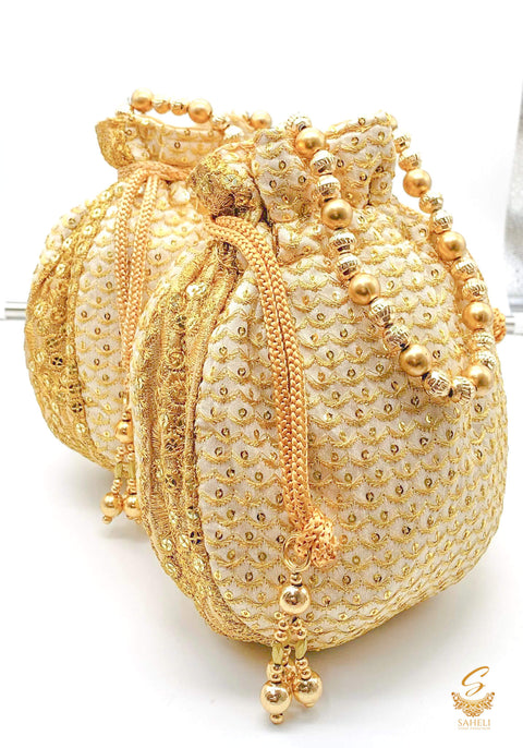 Golden Colour velvet Based embroidered Work With Pearl Work Handle Beautiful Potli Bag