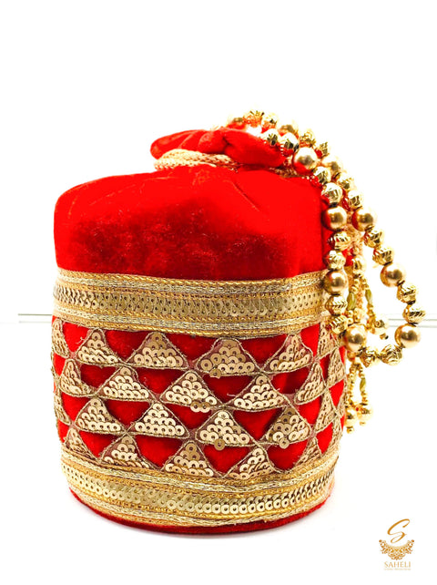 Red colour velvet based sequined work with pearl work handle beautiful Potli Bag