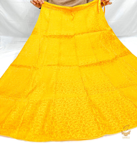 Mustard colour Brocade Silk based big flared skirt (can be styled with Poncho Blouse) Waist :- 37inch , Length:- 40